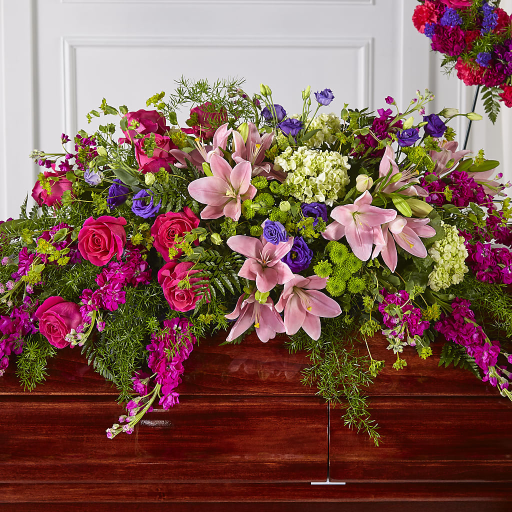 Radiant Tribute Casket Spray – Oopsie Daisy Florist, Raeford NC